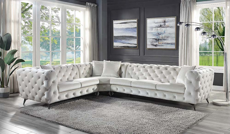 Sofá seccional Atronia de 133" de largo con 4 almohadas