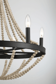 Lámpara colgante de madera estrellada estilo granja con seis velas y cuentas de madera negras para comedor