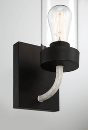 Aplique Zephyr de una luz con cristal transparente y acabado en metal negro