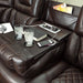 Warnerton Reclining Loveseat with Adjustable Headrest - Canales Furniture